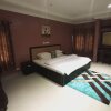 Отель Quztan Suites Ibadan в Ибадане
