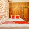 Отель OYO Homes 93598 Omah Baturan Syariah, фото 21
