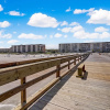 Отель Amelia by the Sea Oceanfront Condo with Access to Private Fishing Pier by RedAwning, фото 37