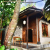 Отель The Riverside Javanese Cottages, фото 1