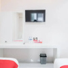 Отель Reddoorz Plus Near Deli Park Mall Medan, фото 3
