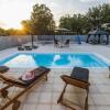 Отель Beautiful villa with private swimming pool, nice covered terrace, play area, BBQ, фото 3
