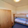 Отель Ferienhof Alte Mühle - Wohnung 3 в Фемарне