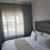Отель Sarona city Habitat Alpha apartments C202 Gaborone, фото 17