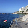 Отель Blue Harbour 3 bedroom seafront apartment with large yard on the promenade - by Getawaysmalta, фото 13