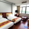 Отель Xianglong Business Hotel, фото 1