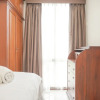 Отель Homey And Cozy Stay 2Br Puri Casablanca Apartment, фото 1