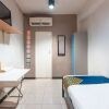 Отель SPOT ON 2033 Kayumanis Homestay Syariah, фото 9