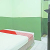 Отель OYO 92994 Wisma Kencana Indah, фото 11