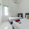 Отель Urbanview Hotel La De Grizz Syariah Sampit by RedDoorz, фото 6