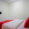 Отель OYO 1569 Kupula Guest House, фото 3