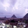 Отель Golden Pyramids View Inn в Гизе