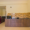 Отель OYO 16157 Home Casa Laguna Lake View Studio, фото 2