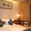 Отель Lijiang Stay Long Guest House, фото 3