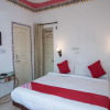 Отель OYO 12726 Home Heritage Lake View Hanuman Ghat, фото 5