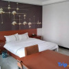 Отель Yilong Business Hotel, фото 3