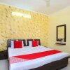 Отель OYO 19765 Royal Guest House, фото 7