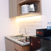 Отель Comfy And Strategic Studio Apartment At Bassura City, фото 5