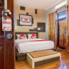 Отель OYO 619 Naufal Guest House Syariah, фото 2