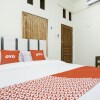 Отель Penginapan Anggrek Syariah 2 by OYO Rooms, фото 12