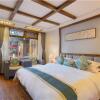 Отель Floral Hotel Lijiang QianlizoudanjiYunju, фото 8