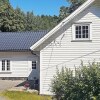 Отель 4 Star Holiday Home in Høvåg, фото 16