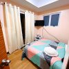 Отель New Cozy 2 bedroom unit condotel for staycation with living room and kitchen set with pool, фото 38
