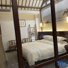 Отель Fuyang Huaiwang Bieyuan Homestay (Raozhou Ancient Town Branch), фото 4
