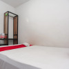 Отель Reddoorz Near Jembatan Makalam, фото 7