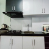 Отель Compact and Cozy Tamansari Mahogany Studio Apartment, фото 10