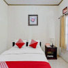 Отель Collection O 90461 Graha Atmadja Syariah Guest House, фото 7