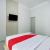 Отель OYO Flagship 90756 Melasti Hills Room & Cafe, фото 4