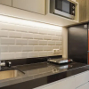 Отель Stunning Studio at Ciputra World 2 Apartment, фото 5