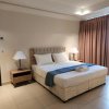 Отель Lovely One Bedroom Apartment Porto Arabia, The Pearl Qatar, фото 1
