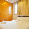 Отель Spacious And Homey 2Br At Nuasa Hijau Pondok Indah Apartment, фото 15