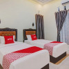 Отель Capital O 90643 Suri Guest House Syariah, фото 6
