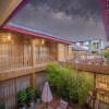 Отель Wo Chan Inn Old Town в Лицзяне