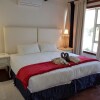 Отель Dream Beach Self Catering Lodge в Понте д'Оуро