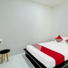 Отель OYO 92433 Sirih Gading Family Guest House, фото 5
