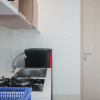 Отель Comfort and Cozy 1BR at Tree Park City BSD Apartment, фото 1