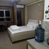 Отель EXPRESS O 91863 Mekarwangi M-square Apartment By Santosa Property, фото 16