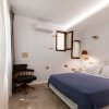 Отель Arco Naxos Luxury Apartments, фото 6