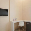 Отель RedDoorz Syariah near Sultan Syarif Kasim II Airport, фото 3