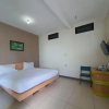 Отель Candi Panggung Family Guest House Syariah by OYO Rooms, фото 12