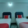 Отель OYO 24579 Flagship Hotel Padmam, фото 22