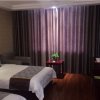Отель GreenTree Inn Gansu Jiuquan Guazhou Zhangzhi Park Express Hotel, фото 2