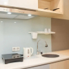 Отель Nice and Modern Studio at Tamansari Iswara Apartment, фото 14