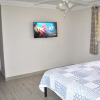 Отель Lovely 3-bd, walk to bars, 9 min drive from beach! Heated pool., фото 1
