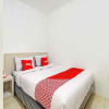 Отель Menjangan Residence At De Priok by OYO Rooms, фото 4
