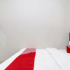 Отель OYO 91505 Elif Homestay Syariah, фото 7